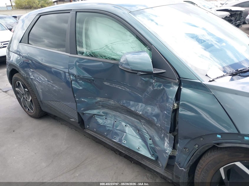 2022 Hyundai Ioniq 5 VIN KM8KNDAF3NU104045 IAAI salvage auction — SIDE, Salvage Title, sold $8,300 on 2026-07-11 (photo 6)