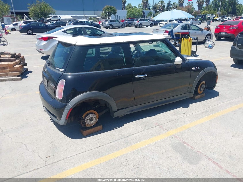 2004 Mini Cooper VIN WMWRE33434TD79265 IAAI salvage auction — LEFT SIDE, Salvage (California), sold $150 on 2026-07-20 (photo 4)