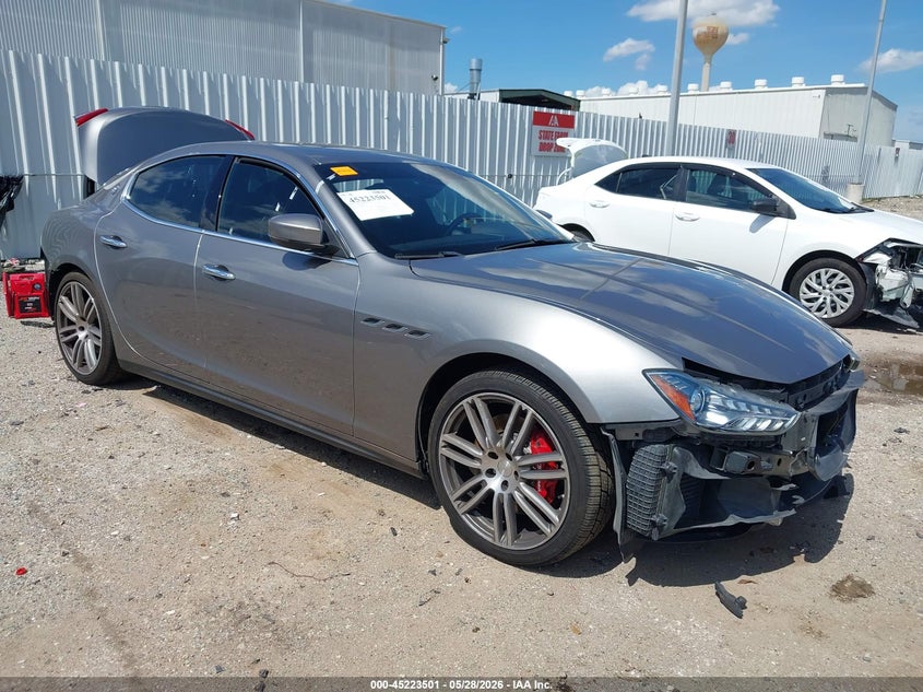 2019 Maserati Ghibli VIN ZAM57YSA6K1311138 IAAI salvage auction — SIDE, Salvage Title, sold $4,000 on 2026-07-29 (photo 1)