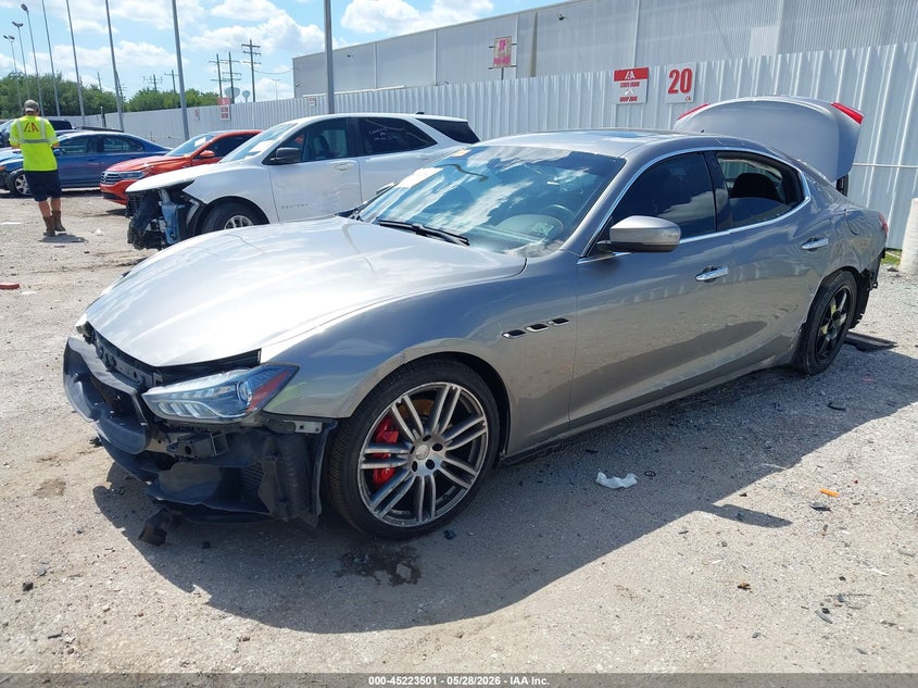 2019 Maserati Ghibli VIN ZAM57YSA6K1311138 IAAI salvage auction — SIDE, Salvage Title, sold $4,000 on 2026-07-29 (photo 2)