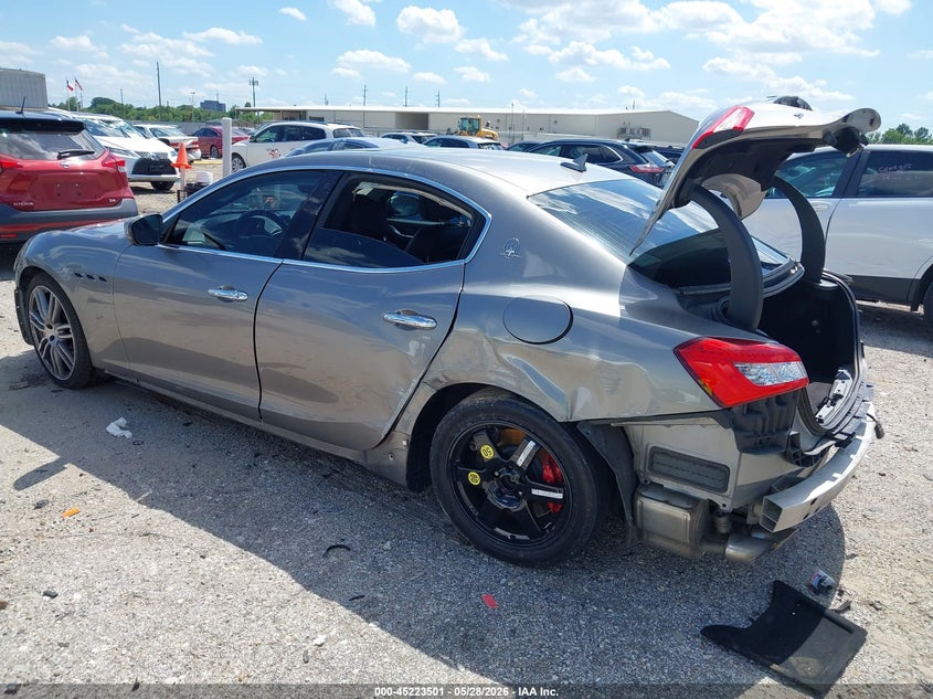 2019 Maserati Ghibli VIN ZAM57YSA6K1311138 IAAI salvage auction — SIDE, Salvage Title, sold $4,000 on 2026-07-29 (photo 3)