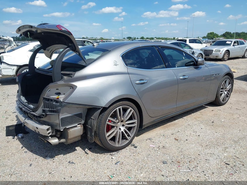 2019 Maserati Ghibli VIN ZAM57YSA6K1311138 IAAI salvage auction — SIDE, Salvage Title, sold $4,000 on 2026-07-29 (photo 4)