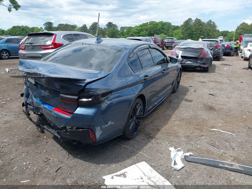 2023 BMW 5er VIN WBA13AG09PCM09854 IAAI salvage auction — REAR END, Salvage Title, sold $10,650 on 2026-07-07 (photo 4)