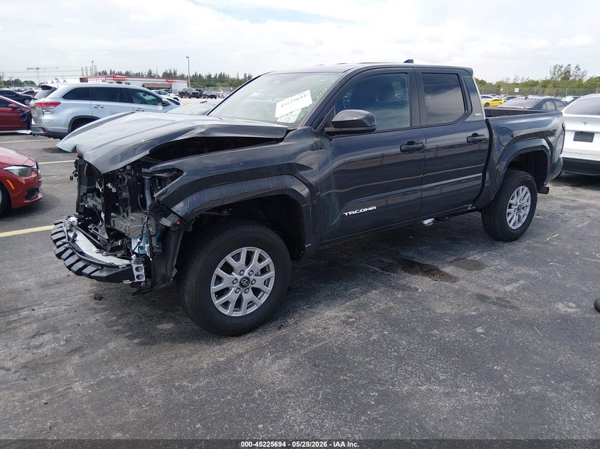 2026 Toyota Tacoma VIN 3TYKB5FNXTT035881 IAAI salvage auction — FRONT END, Rebuildable (Florida), sold $14,400 on 2026-07-16 (photo 2)