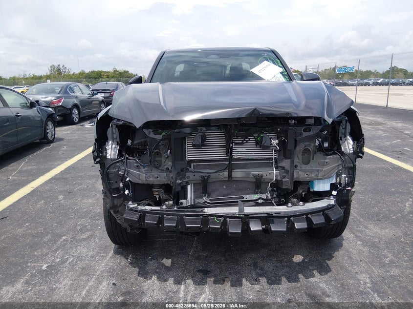 2026 Toyota Tacoma VIN 3TYKB5FNXTT035881 IAAI salvage auction — FRONT END, Rebuildable (Florida), sold $14,400 on 2026-07-16 (photo 6)