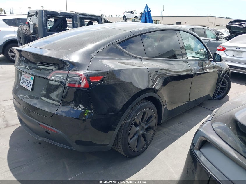 2025 Tesla Model y VIN 7SAYGDED1SF321375 IAAI salvage auction — LEFT FRONT, Salvage Certificate (California), sold $12,825 on 2026-07-22 (photo 4)
