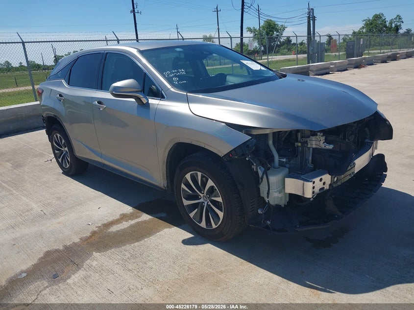 2022 Lexus Rx VIN 2T2AZMAA6NC250442 IAAI salvage auction — FRONT & REAR, Original (Texas), sold $11,600 on 2026-07-10 (photo 1)
