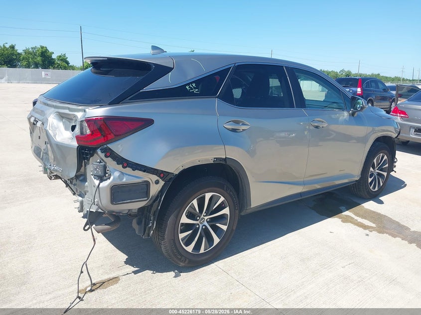 2022 Lexus Rx VIN 2T2AZMAA6NC250442 IAAI salvage auction — FRONT & REAR, Original (Texas), sold $11,600 on 2026-07-10 (photo 4)