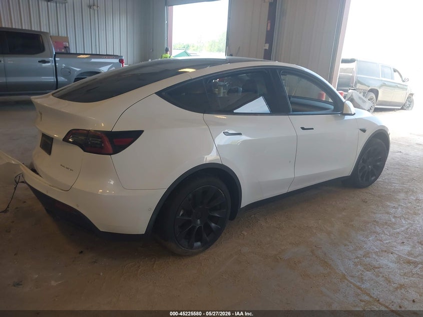 2022 Tesla Model y VIN 7SAYGDEE1NF317761 IAAI salvage auction — LEFT SIDE, Salvage (Michigan), sold $6,775 on 2026-07-09 (photo 4)