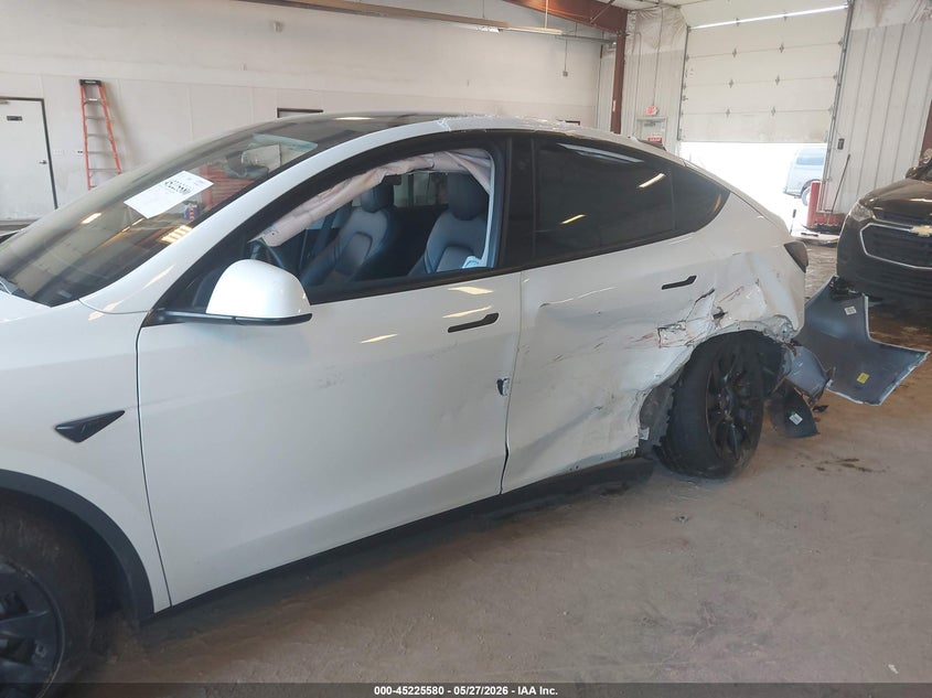 2022 Tesla Model y VIN 7SAYGDEE1NF317761 IAAI salvage auction — LEFT SIDE, Salvage (Michigan), sold $6,775 on 2026-07-09 (photo 6)