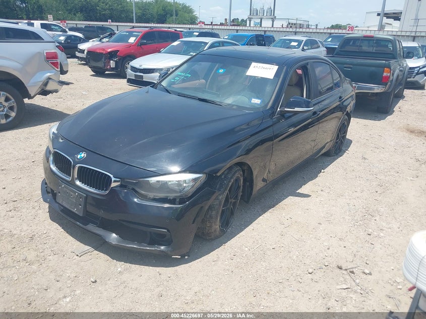 2016 BMW 3er VIN WBA8E5G52GNT93769 IAAI salvage auction — FRONT & REAR, Original (Texas), sold $1,000 on 2026-07-16 (photo 2)