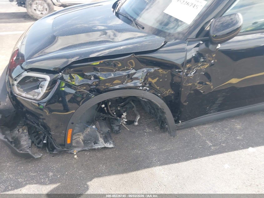 2025 Mini VIN WMZ53GA02S7R60449 IAAI salvage auction — LEFT SIDE, Salvage Title, sold $6,000 on 2026-08-15 (photo 6)