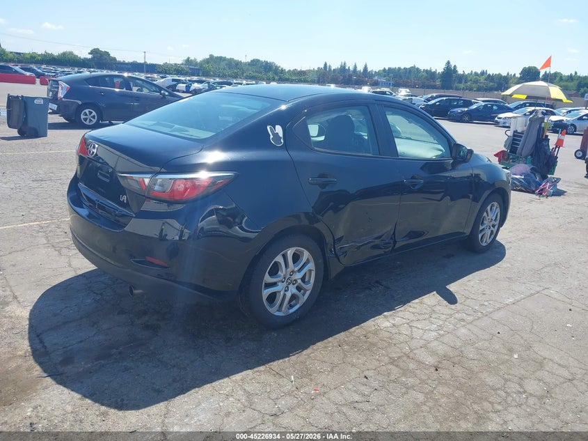 2016 Scion Ia VIN 3MYDLBZV3GY134618 IAAI salvage auction — SIDE, Salvage (Oregon), sold $2,625 on 2026-08-27 (photo 4)