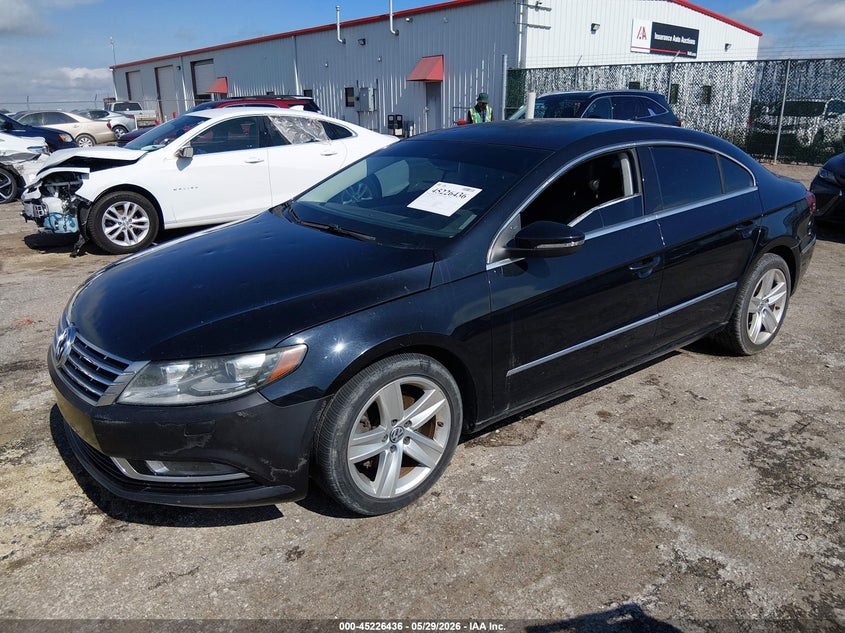 2014 Volkswagen Passat cc VIN WVWBP7ANXEE536603 IAAI salvage auction — HAIL, Salvage Title, sold $975 on 2026-08-07 (photo 2)