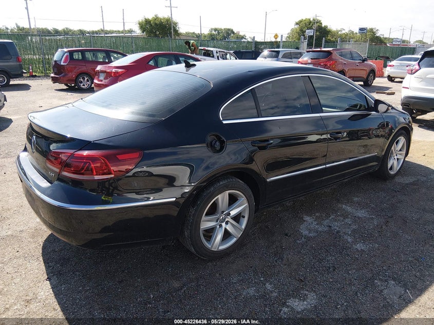 2014 Volkswagen Passat cc VIN WVWBP7ANXEE536603 IAAI salvage auction — HAIL, Salvage Title, sold $975 on 2026-08-07 (photo 4)