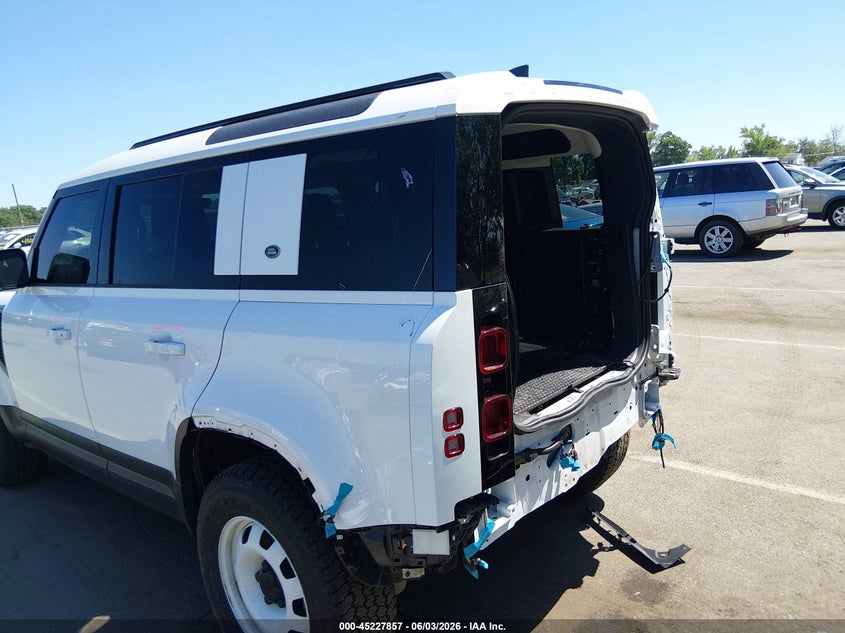 2023 Land rover Defender VIN SALEK7EX8P2230861 IAAI salvage auction — REAR END, Salvage Title, sold $18,500 on 2026-08-27 (photo 6)