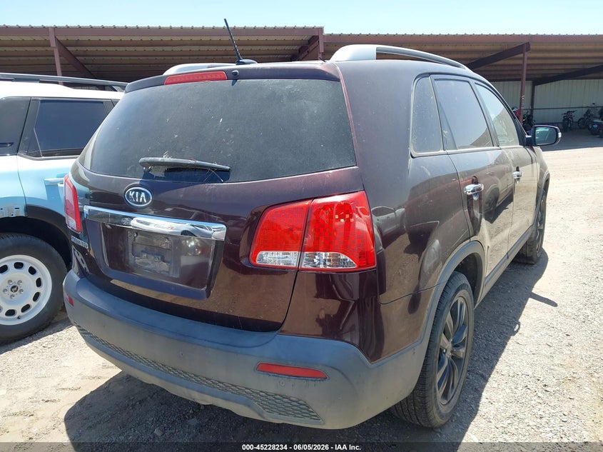 2011 Kia Sorento VIN 5XYKT4A29BG142738 IAAI salvage auction — NORMAL WEAR, Clear (Montana), sold $650 on 2026-07-28 (photo 4)