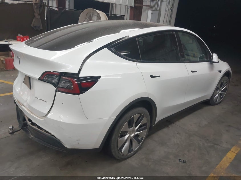 2023 Tesla Model y VIN 7SAYGDEE3PF608085 IAAI salvage auction — REAR END, Salvage Title, sold $9,200 on 2026-07-16 (photo 4)