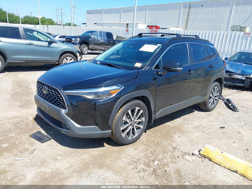 2023 Toyota Corolla cross VIN 7MUDAAAG6PV045649 IAAI salvage auction — SIDE, Salvage Title, sold $8,400 on 2026-07-23 (photo 2)