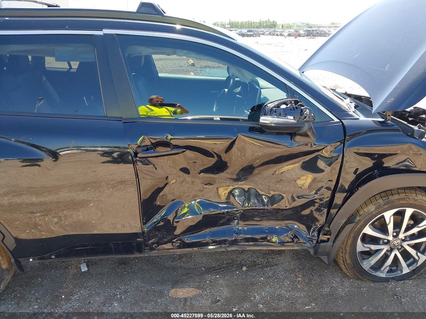 2023 Toyota Corolla cross VIN 7MUDAAAG6PV045649 IAAI salvage auction — SIDE, Salvage Title, sold $8,400 on 2026-07-23 (photo 6)