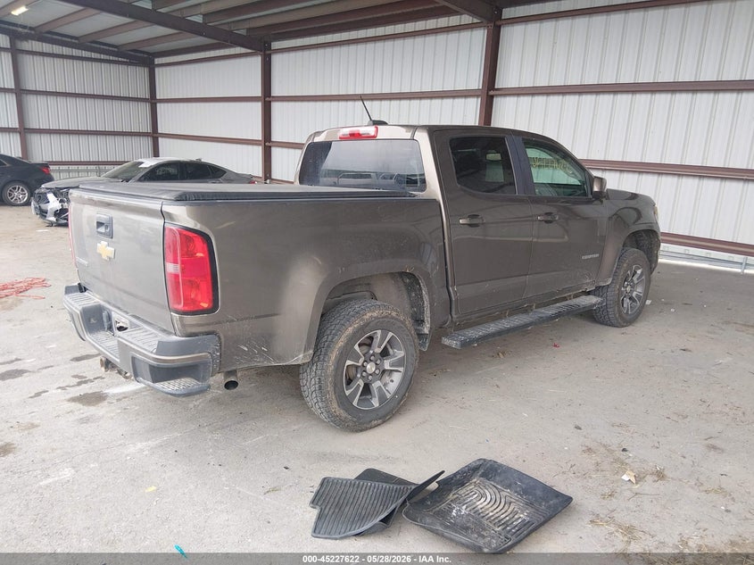 2015 Chevrolet Colorado VIN 1GCGTCE35F1184834 IAAI salvage auction — STORM DAMAGE, Clear (Missouri), sold $4,200 on 2026-07-09 (photo 4)