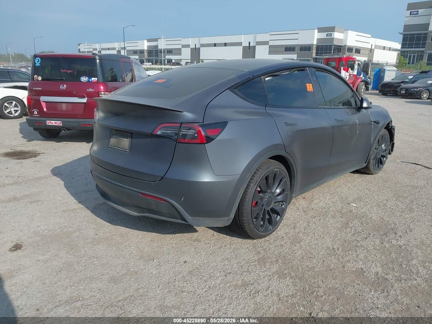 2023 Tesla Model y VIN 7SAYGDEFXPF802279 IAAI salvage auction — BIO HAZARD, Salvage Title, sold $9,550 on 2026-07-23 (photo 4)