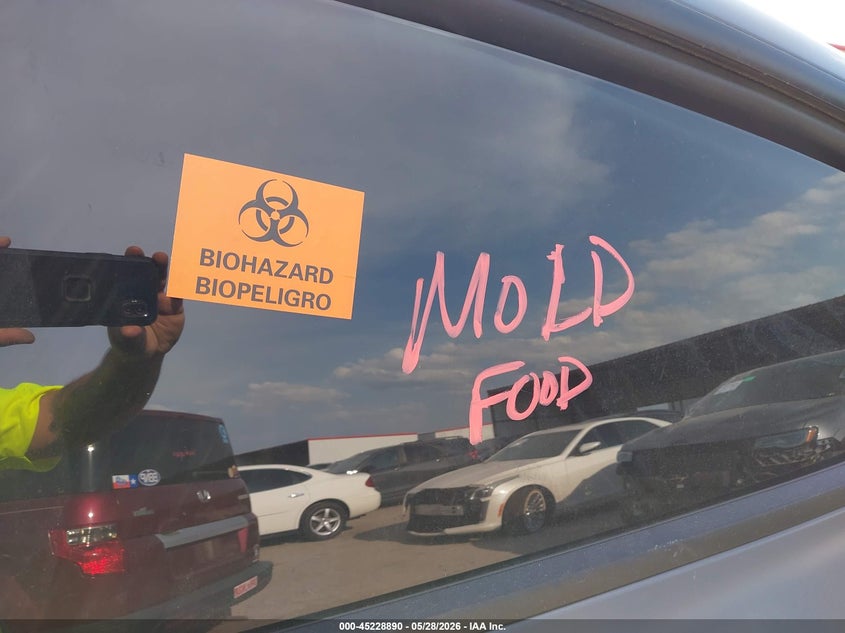 2023 Tesla Model y VIN 7SAYGDEFXPF802279 IAAI salvage auction — BIO HAZARD, Salvage Title, sold $9,550 on 2026-07-23 (photo 6)