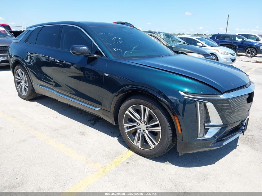 2024 Cadillac Lyriq VIN 1GYKPRRL1RZ115246 IAAI salvage auction — LEFT SIDE, Salvage Title, sold $11,600 on 2026-08-21 (photo 1)