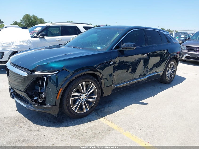 2024 Cadillac Lyriq VIN 1GYKPRRL1RZ115246 IAAI salvage auction — LEFT SIDE, Salvage Title, sold $11,600 on 2026-08-21 (photo 2)