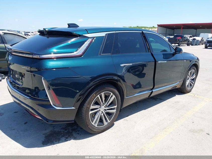 2024 Cadillac Lyriq VIN 1GYKPRRL1RZ115246 IAAI salvage auction — LEFT SIDE, Salvage Title, sold $11,600 on 2026-08-21 (photo 4)