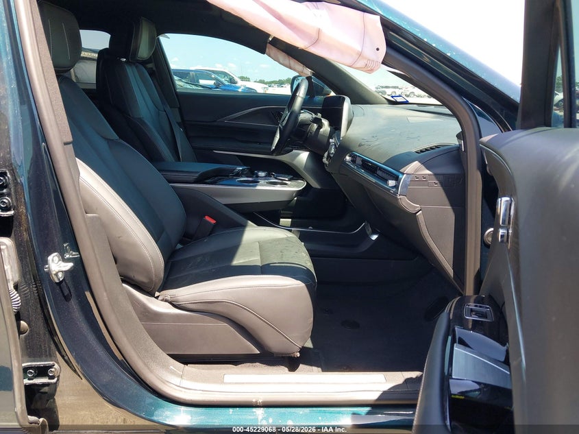 2024 Cadillac Lyriq VIN 1GYKPRRL1RZ115246 IAAI salvage auction — LEFT SIDE, Salvage Title, sold $11,600 on 2026-08-21 (photo 5)