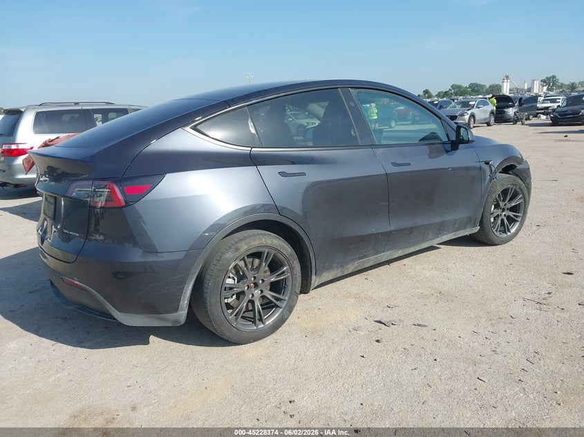 2024 Tesla Model y VIN 7SAYGDEE3RA301127 IAAI salvage auction — FRONT END, Salvage Title, sold $13,200 on 2026-07-05 (photo 4)
