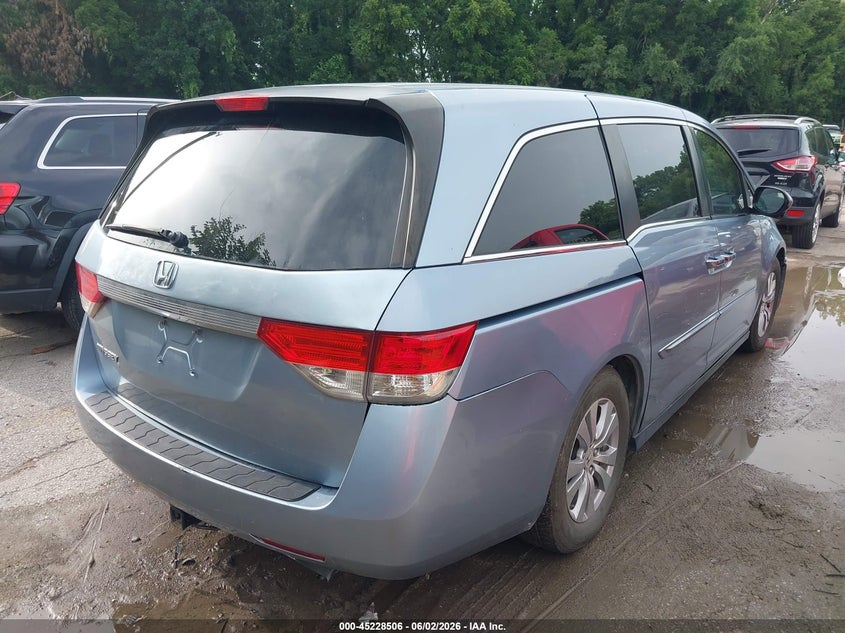 2014 Honda Odyssey VIN 5FNRL5H46EB057900 IAAI salvage auction — HAIL, Salvage (Kansas), sold $1,525 on 2026-07-05 (photo 4)