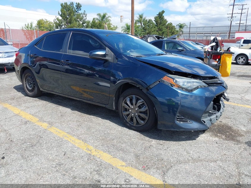 2018 Toyota Corolla VIN 5YFBURHE6JP808667 IAAI salvage auction — SIDE, Salvage Title, sold $2,700 on 2026-07-14 (photo 1)