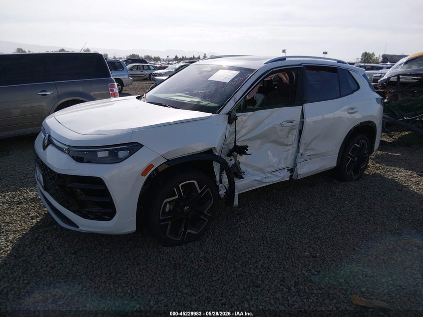 2026 Volkswagen Tiguan VIN 3VVUW7RM6TM077697 IAAI salvage auction — SIDE, Salvage Title, sold $10,700 on 2026-07-31 (photo 2)
