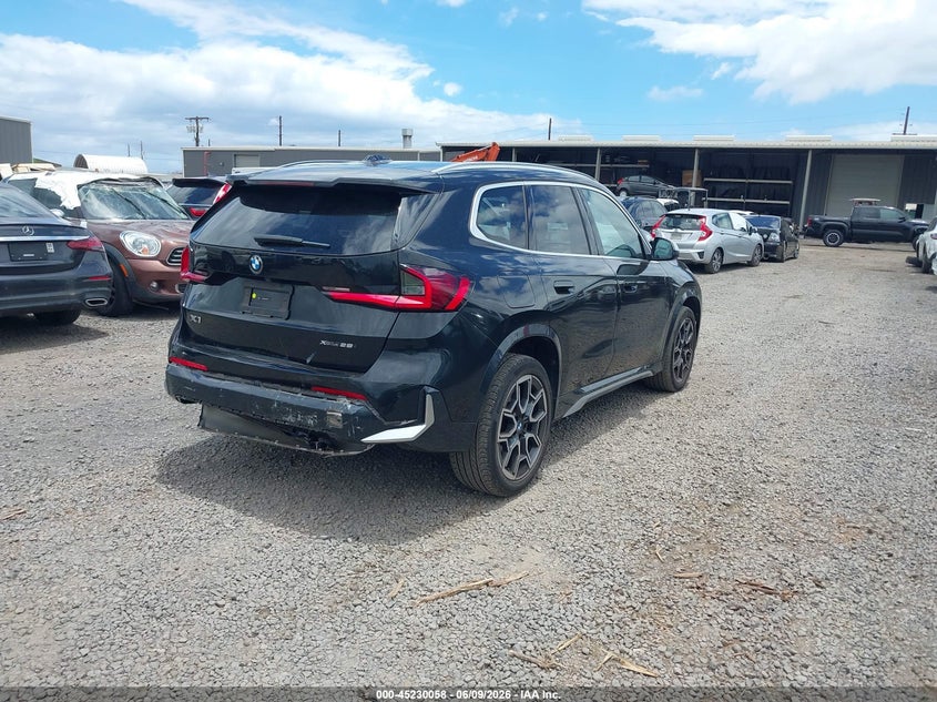 2023 BMW X1 VIN WBX73EF09P5X62141 IAAI salvage auction — REAR END, Salvage (Hawaii), sold $7,500 on 2026-10-25 (photo 4)