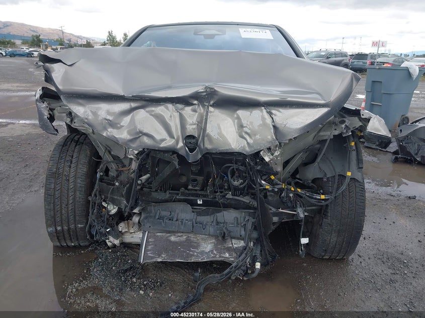 2023 BMW Ix VIN WB523CF03PCM19294 IAAI salvage auction — FRONT & REAR, Salvage (California), sold $5,200 on 2026-07-06 (photo 6)