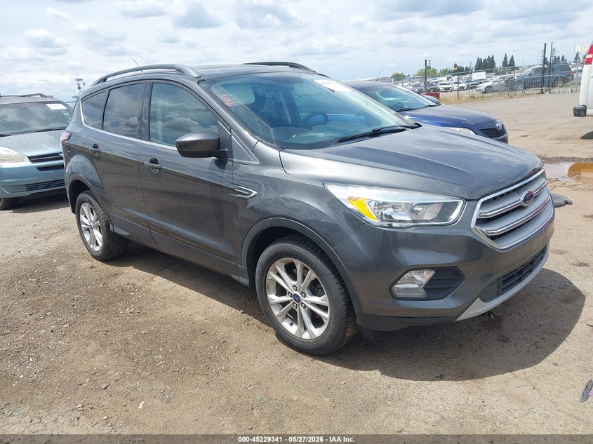 2018 Ford Escape VIN 1FMCU0GD5JUC77033 IAAI salvage auction — NORMAL WEAR, Salvage Title, sold $4,875 on 2026-07-22 (photo 1)