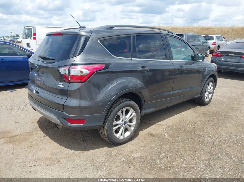 2018 Ford Escape VIN 1FMCU0GD5JUC77033 IAAI salvage auction — NORMAL WEAR, Salvage Title, sold $4,875 on 2026-07-22 (photo 4)
