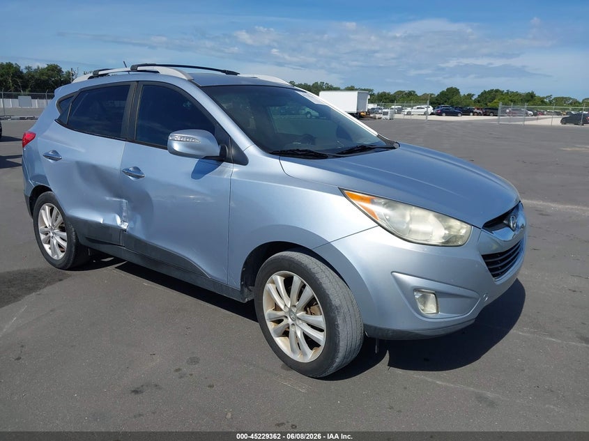 2013 Hyundai Tucson VIN KM8JU3AC9DU588624 IAAI salvage auction — SIDE, Salvage Title, sold $2,250 on 2026-07-29 (photo 1)