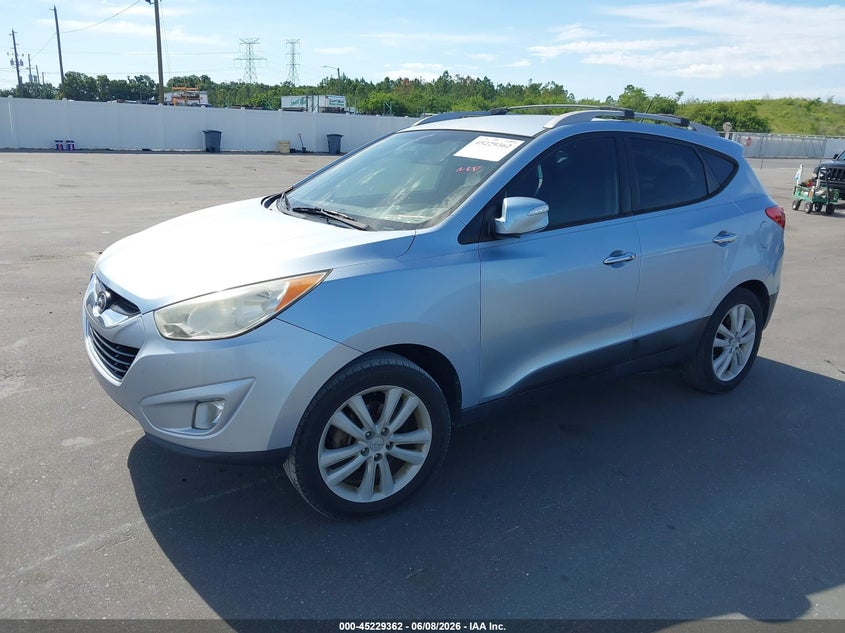 2013 Hyundai Tucson VIN KM8JU3AC9DU588624 IAAI salvage auction — SIDE, Salvage Title, sold $2,250 on 2026-07-29 (photo 2)