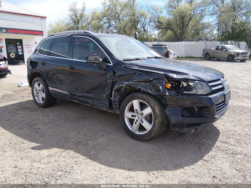 2012 Volkswagen Touareg VIN WVGFF9BP0CD001133 IAAI salvage auction — RIGHT SIDE, Salvage (Montana), sold $925 on 2026-08-05 (photo 1)