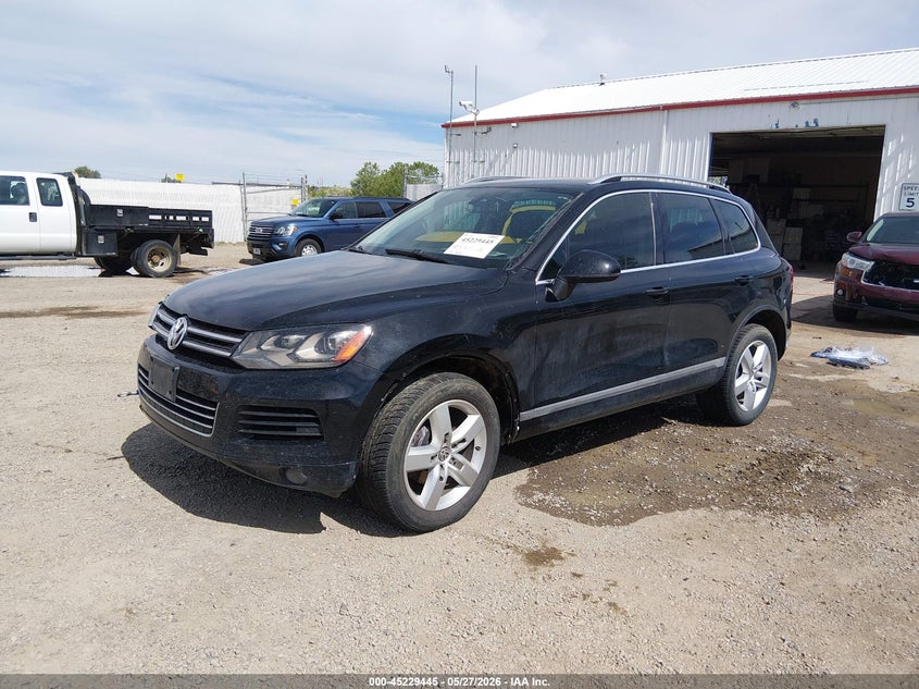 2012 Volkswagen Touareg VIN WVGFF9BP0CD001133 IAAI salvage auction — RIGHT SIDE, Salvage (Montana), sold $925 on 2026-08-05 (photo 2)