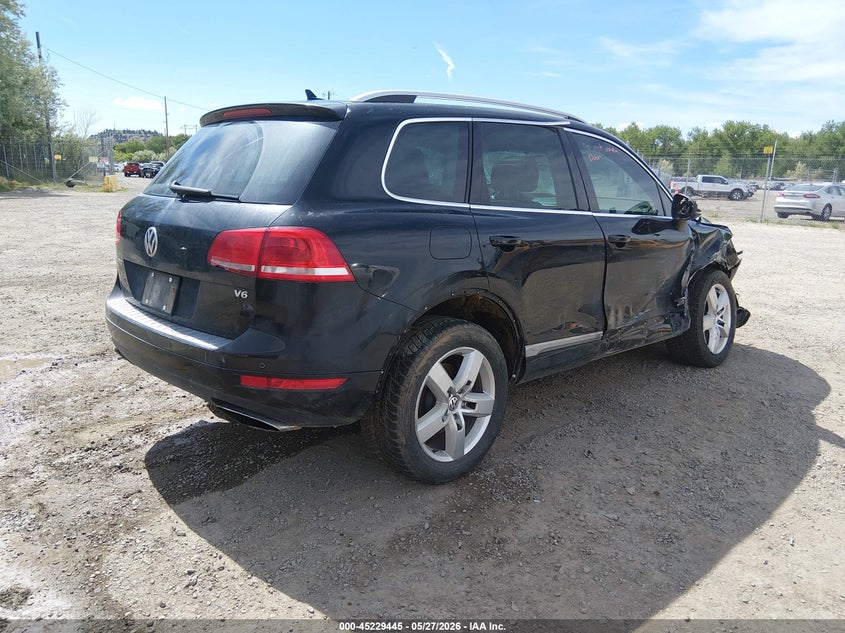 2012 Volkswagen Touareg VIN WVGFF9BP0CD001133 IAAI salvage auction — RIGHT SIDE, Salvage (Montana), sold $925 on 2026-08-05 (photo 4)