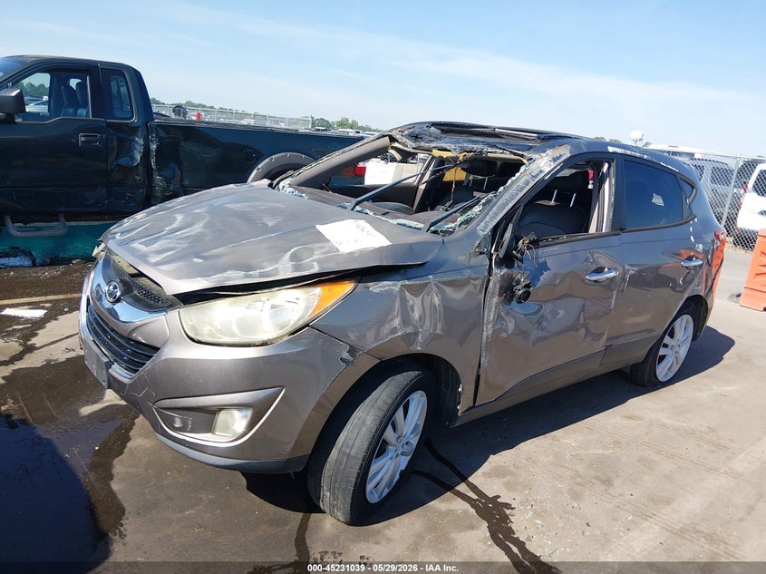 2012 Hyundai Tucson VIN KM8JUCAC8CU538005 IAAI salvage auction — ROLLOVER, Salvage Title, sold $300 on 2026-07-09 (photo 6)