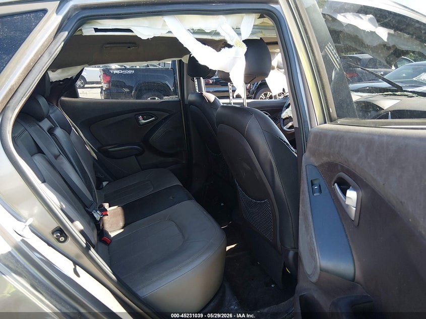 2012 Hyundai Tucson VIN KM8JUCAC8CU538005 IAAI salvage auction — ROLLOVER, Salvage Title, sold $300 on 2026-07-09 (photo 8)