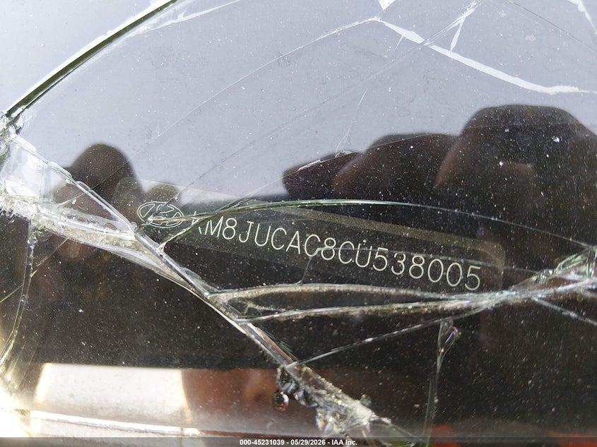 2012 Hyundai Tucson VIN KM8JUCAC8CU538005 IAAI salvage auction — ROLLOVER, Salvage Title, sold $300 on 2026-07-09 (photo 9)