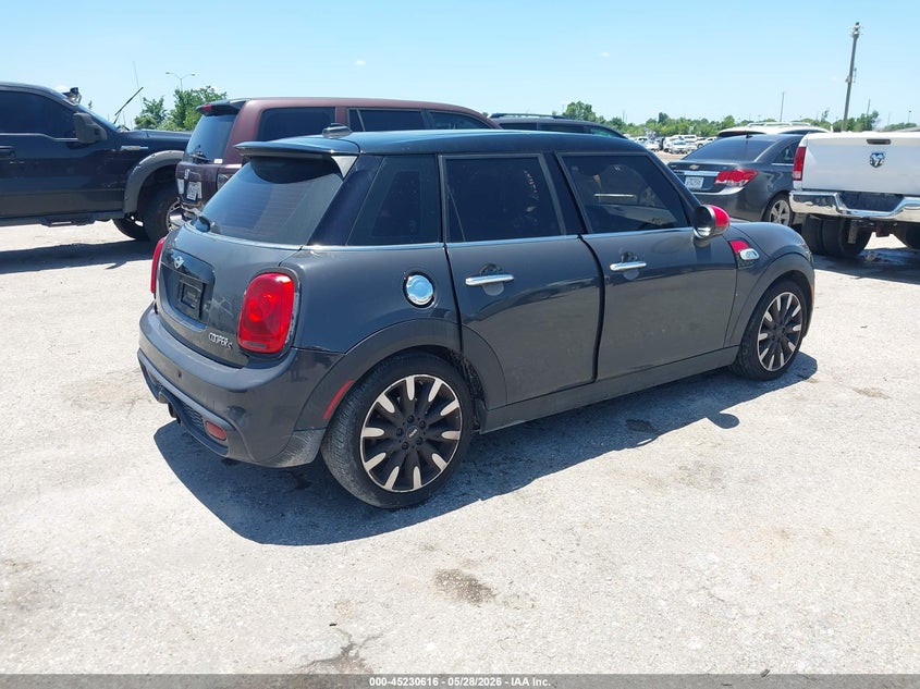 2015 Mini Hardtop VIN WMWXU3C52FT891893 IAAI salvage auction — NORMAL WEAR, Original (Texas), sold $975 on 2026-07-15 (photo 4)