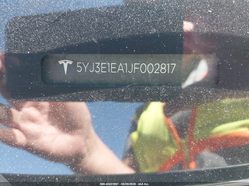 2018 Tesla Model 3 VIN 5YJ3E1EA1JF002817 IAAI salvage auction — FRONT END, Salvage (Michigan), sold $5,400 on 2026-07-12 (photo 9)