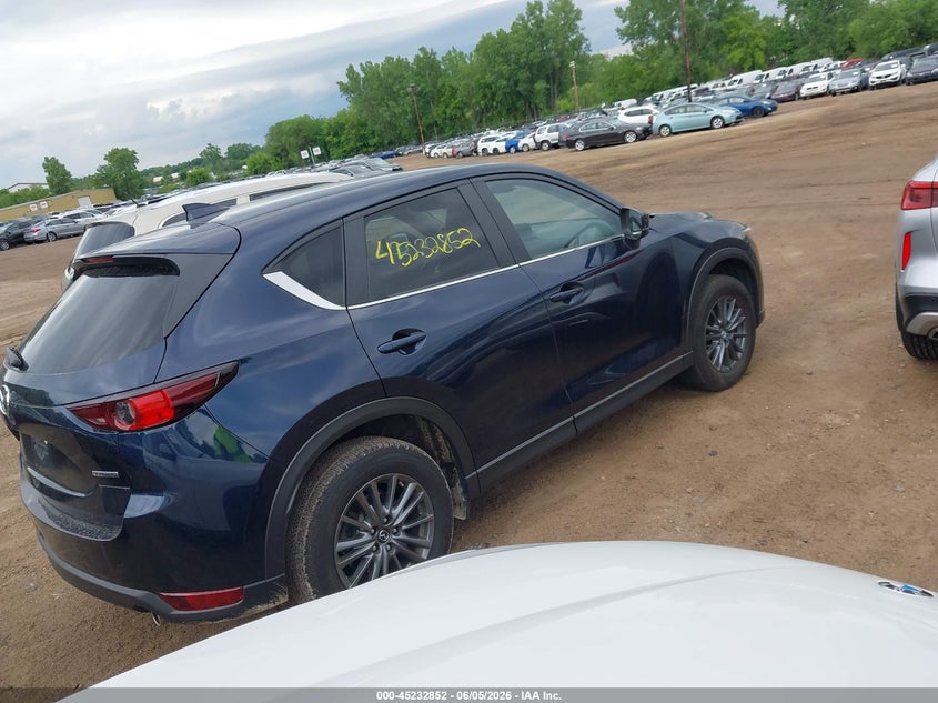 2021 Mazda Cx-5 VIN JM3KFBCM1M1423579 IAAI salvage auction — RIGHT FRONT, Salvage Title, sold $9,000 on 2026-07-08 (photo 4)